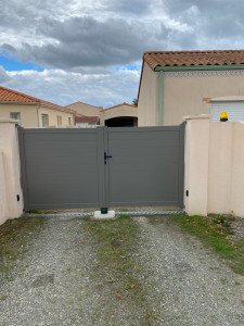 Photo de galerie - Installation d’un portail double battant en aluminium, installation également d’une motorisation complète (CAME)