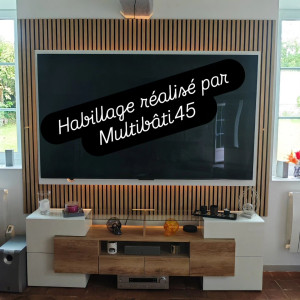 Photo de galerie - Panneaux acoustiques décoratifs derrière la télévision 