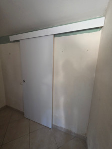 Photo de galerie - Installation d'une porte coulissante 