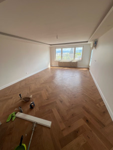 Photo de galerie - Pose des Parquet avec la colle