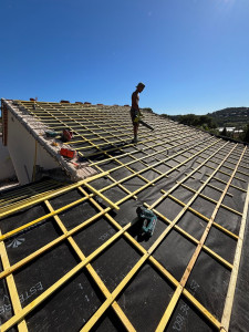 Photo de galerie - Pose d’un écran sous toiture et contre liteaux