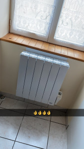 Photo de galerie - Installation d’un radiateur électrique sur du placo