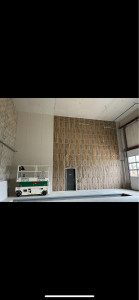 Photo de galerie - Réalisation d’un plafond et d’un doublage avec une hauteur de 9m