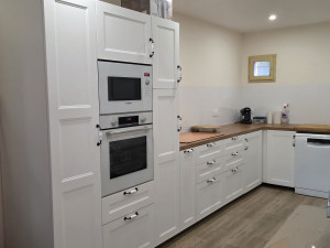 Photo de galerie - Pose d'une cuisine + credence+ électroménager ainsi que la pose du lino