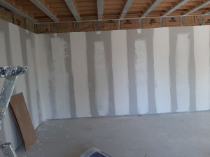 Photo de galerie - Réalisation  de mur en placo  doublage avec joints inclus 