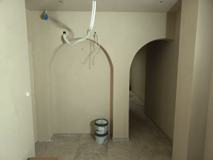 Photo de galerie - Enduit décoratif brosse et lisseuse dans un magasin d'optique 