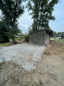 Photo de galerie - Mise au propre d’une d’entrer de garage plus pose de caniveau et évacuation des eaux pluviales 