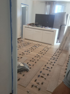 Photo de galerie - Pose de carrelage imitation parquet dans tout l appartement 