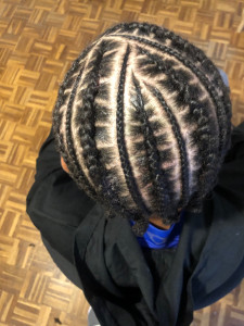Photo de galerie - Nattes collées sur cheveux crépus à densité moyenne