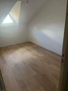 Photo de galerie - Pose de parquet massif collé