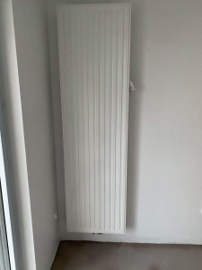 Photo de galerie - Pose de radiateur chauffage saloon.