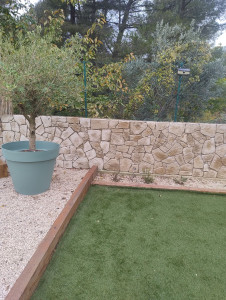 Photo de galerie - Clôture en pierre de parement 