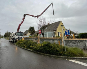 Photo de galerie - Coulage d’un mur de soutènement 