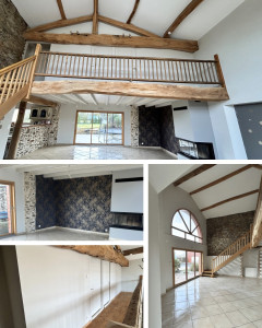 Photo de galerie - Rénovation complète d’une pièce à vivre : préparation des murs (enduit, ponçage), toile de rénovation puis peinture, lambris et poutres repeints, pose de papier peint, escalier vitrifié et portes repeintes. Résultat lumineux et durable.