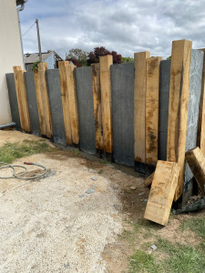 Photo de galerie - Réalisation de mur en bois et pâli ardoise 