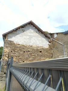 Photo de galerie - Réhabilitation d'un mur en pierre 