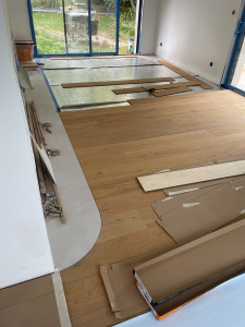 Photo de galerie - Pose de parquet affleurant carrelage avec arrondi 