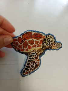 Photo de galerie - Broderie faite main. 