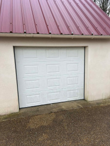 Photo de galerie - Motorisation d'une porte de garage 
