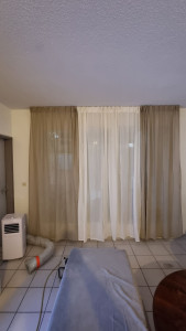 Photo de galerie - Pose de tringles à rideaux au plafond