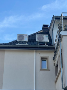 Photo de galerie - Pose unité extérieur climatisation sur toiture