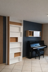 Photo de galerie - Création sur mesure d'une porte secrète 