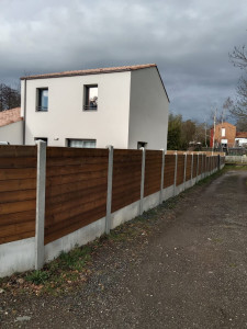 Photo de galerie - Clôture béton et bois






