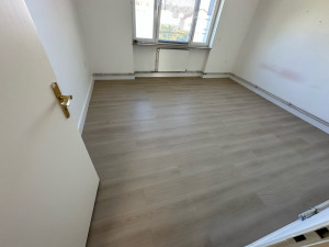 Photo de galerie - Rénovation d’un plancher bois avec finition parquet