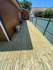 Photo de galerie - Fabrication et pose d’une terrasse de 50m2 en pin traité. 