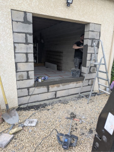 Photo de galerie - Démontage d’une porte de garage et remontage mur 