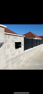Photo de galerie - Mur de clôture et pose de panneaux rigides 