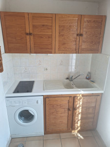 Photo de galerie - Montage meubles haut et bas cuisine et pose plan de travail evier et  plaque vitrocéramique 