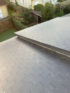 Photo de galerie - Réalisation d’une toiture en ardoise fibro ciment 