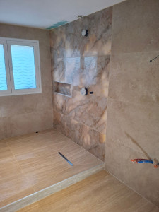 Photo de galerie - Réalisation de l'étanchéité plus création d'une douche Italienne avec niche et pose de carreaux 120x60 .