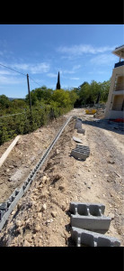 Photo de galerie - Fondation et montage de mur de en agglo banché de 50m de long sur 2m de hauteur 