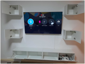 Photo de galerie - Pose d'une TV au mur et montage d'un ensemble de meubles TV.