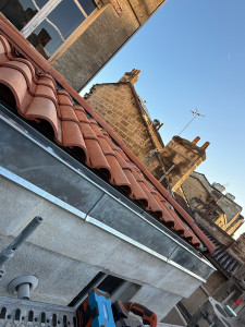 Photo de galerie - Remplacement de la couverture et de l’habillage zinc 