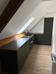 Photo de galerie - Installation cuisine équipé et conception habillage bois 