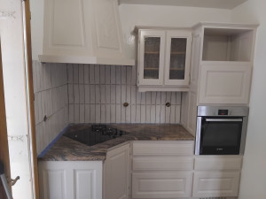 Photo de galerie - Rénovation d'une cuisine repeinte au pistolet 