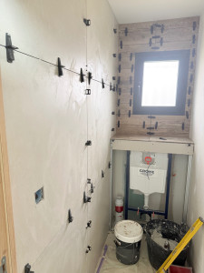 Photo de galerie - Pose de carrelage au sol et aux murs pour les salles de bains