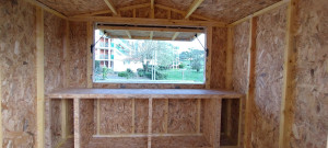 Photo de galerie - Fabrication d'un chalet en bois