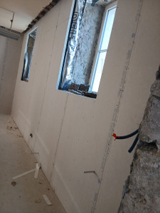 Photo de galerie - Poser de plaques de plâtre sur murs et plafonds avec traitement des joints et preparation des surfaces pour les finition