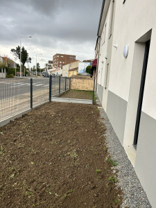 Photo de galerie - Réalisation d’un cloture rigide de 1,50m de haut et remise en forme du terrain 