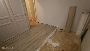 Photo de galerie - Pose de parquet flottant et des plinthes 