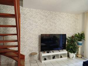 Photo de galerie - Réalisation d'un mur imitation pierre