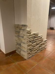 Photo de galerie - Pose de parement sur cheminée 