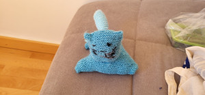 Photo de galerie - Un chat au tricot