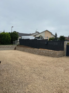 Photo de galerie - Création d un muret en pierre d une cour 