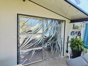 Photo de galerie - Réalisation d'un mur isolant provisoire entre un salon et une véranda. à moindre coût en attente de travaux d'isolation financés par l'état 