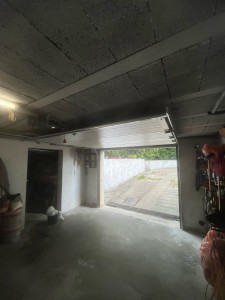Photo de galerie - Installation porte de garage motorisé 
